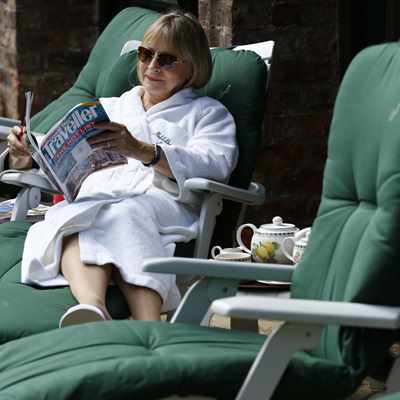 Guest relaxing on sun terrace at Middlethorpe Spa